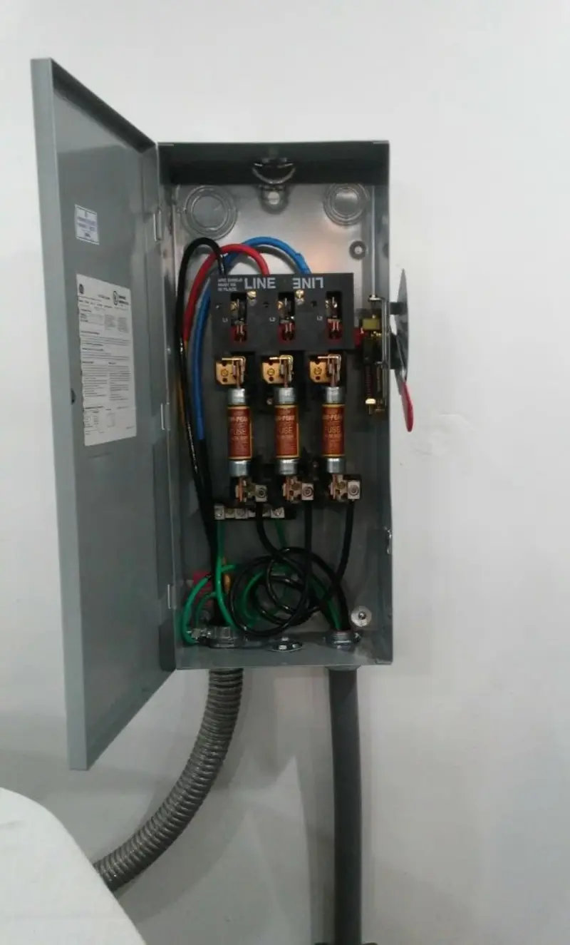 Three-phase disconnect switch installed for Smoke Detector Installation in Clear Lake